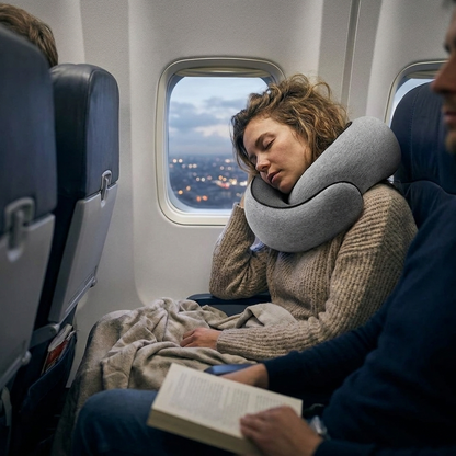 U-shaped travel neck pillow worn by traveler